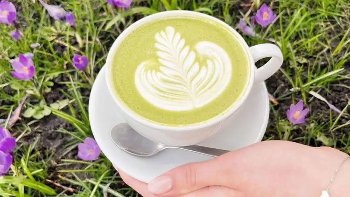 Kopje koffie met koffie art